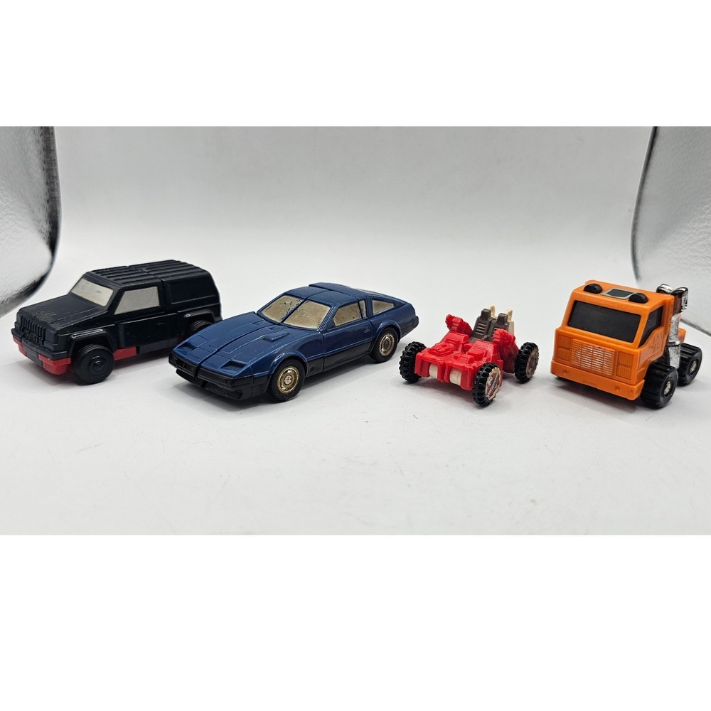 Vintage 1980s GoBots Transformers Lot Bandai Hans-Cuff Tonka Jeep Powerglide